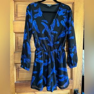 Women’s Express romper size small. Black with blue feathers.